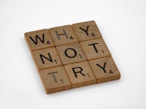 Why not try spelt in scrabble pieces against a white background