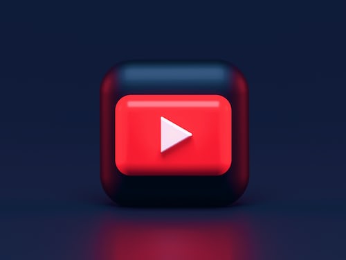 The YouTube logo on a small black piece of filming equipment
